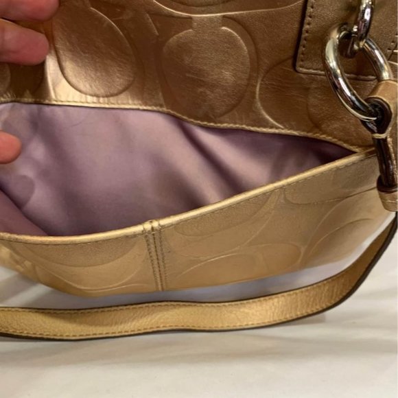 COACH gold handbag. Purple lining. Embedded coach logo. Big outside pock… - Picture 6 of 10